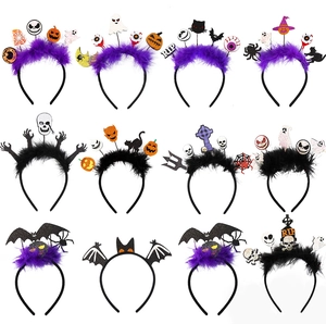 Set of 12 Halloween headbands featuring pumpkin, ghost, and bat designs with feathers