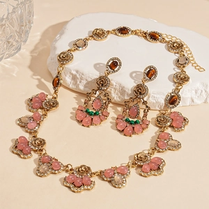 Vintage gold jewelry set with pink stones and brown tiger eye drop pendant