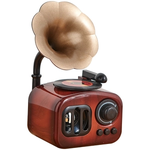 Retro vintage phonograph music box with deep reddish brown wood grain and golden horn