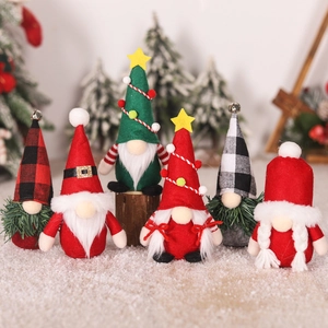 Detailed view of six assorted handmade Christmas gnomes on snowy surface with holiday background