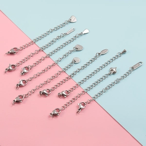 Polished silver stainless steel jewelry extender chains with lobster clasps and heart tags