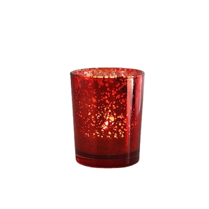 Starry electroplated red glass Christmas candle holder with golden flecks and warm glow