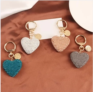 Sparkling crystal heart keychains in blue, silver, gold, and grey with gold lobster clasps