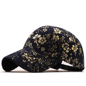 Retro denim baseball cap for women with gold floral pattern and distressed finish