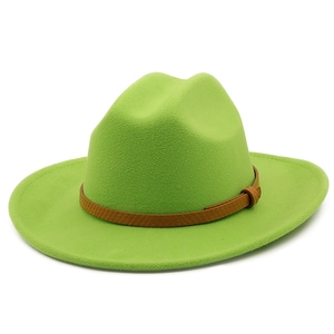 Detail of neon green wool fedora hat featuring a vintage brown faux leather band