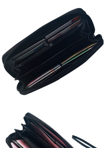Detailed view of the black skull wallet interior with multiple card slots and zip pocket