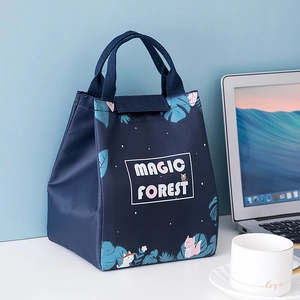 Cute navy blue insulated lunch bag with magic forest animal print for office and school.