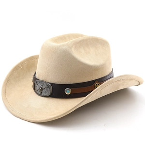 Detail of western cowboy hat with turquoise rivets and vintage silver bull head buckle