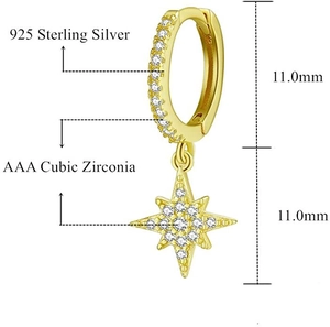 Macro detail of asymmetric star drop earring in 925 sterling silver with cubic zirconia