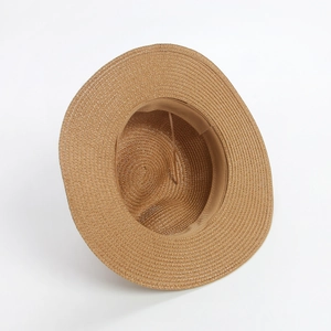 Detailed top view of khaki straw hat showing fine weaving texture and adjustable inner strap