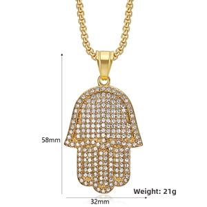 Detailed dimensions of gold Hamsa pendant showing 58mm height and 32mm width