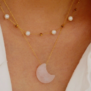 Double-layered 14K gold necklace with white pearl accents and pink moonstone pendant