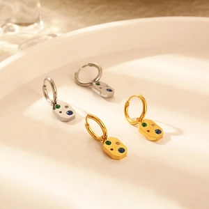 Polished stainless steel hoop earrings with colorful gemstones in gold and silver finish