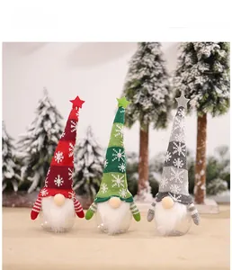 Three-piece set of Christmas gnome candy jars with knitted snowflake hats and clear bodies