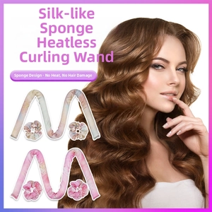 Detail of silk-like foam heatless hair curlers showing tie-dye pattern and wavy hair results