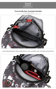Detailansicht der schwarzen Totenkopf-Tasche mit Hauptfach und vorderem Fach für Zubehör
