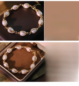 Detailed macro view of handmade wire-wrapped freshwater pearl bracelet with golden wire finish
