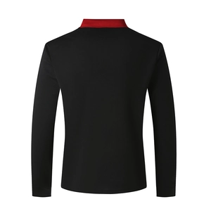 Detailed back view of a slim-fit long sleeve polo shirt in black with a red contrast collar