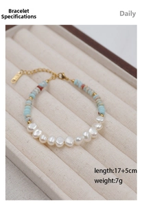 Detail of handmade pearl and stone beaded bracelet with gold clasp and 17+5cm extension