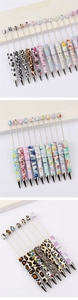 Detailed close-up of colorful DIY beadable pens with assorted floral and leopard prints
