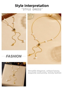 Detail of adjustable gold-plated necklace featuring white pearls and a sliding toggle clasp