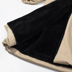 Women hooded long parka featuring khaki outer fabric and thick black faux fur lining