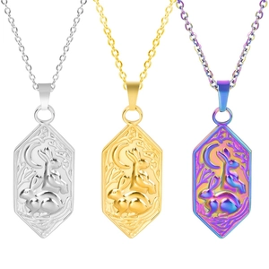 Detailed comparison of hexagonal rabbit and moon pendants in silver, gold and rainbow finishes