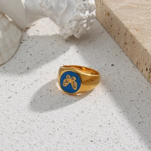 18K gold plated stainless steel ring with blue oval inlay and butterfly zircon accents