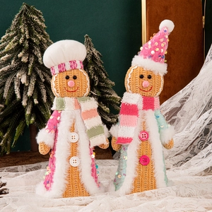 Handcrafted Christmas gingerbread figurines with sequin details and cozy knitted textures