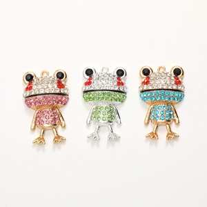 Three glittering rhinestone cartoon frog charms in pink, green, and blue for DIY jewelry