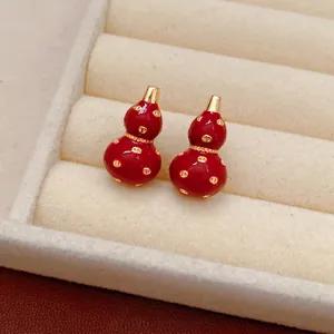 18k gold plated red gourd earrings with golden ring details in luxury gift box