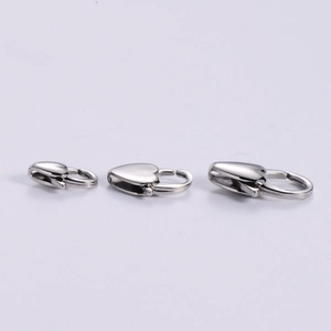 Close-up of heart lobster clasps in small medium and large sizes with polished silver finish