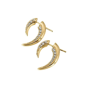 Close-up of gold crescent moon earrings featuring shimmering clear zircon stones inlay