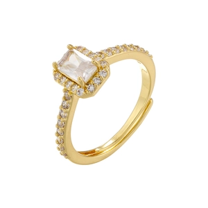 Detail of 18K gold plated ring featuring a rectangle zircon with halo and paved diamonds