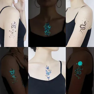 Blue Luminous Temporary Tattoo Stickers Waterproof Glow In The Dark Body Art For Music Festival Party Snake Butterfly Celestial Designs