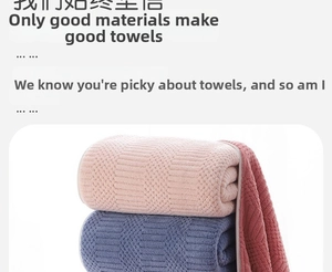 Detail of coral fleece towels featuring thick honeycomb texture and soft knit fabric