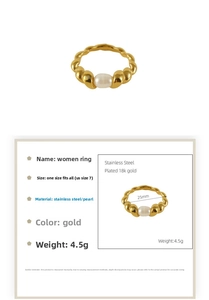 Detail of 18k gold plated stainless steel rope ring featuring a white natural pearl