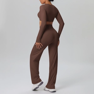 Detail view of chocolate brown yoga set featuring long sleeve top and wide leg pants