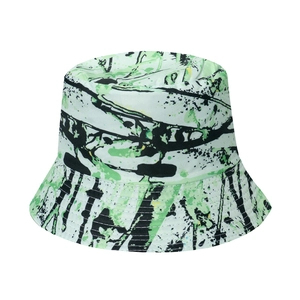 Graffiti bucket hat with abstract ink splash pattern in green, black, and white design