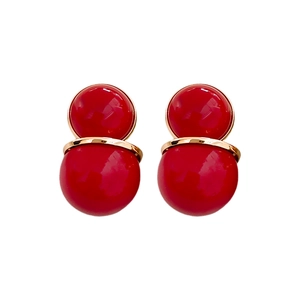 Elegant red double pearl stud earrings with gold metal ring on a clean white background