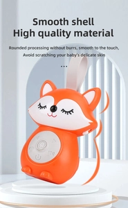 Detail of fox baby soother showing smooth ABS material and multi-function control buttons