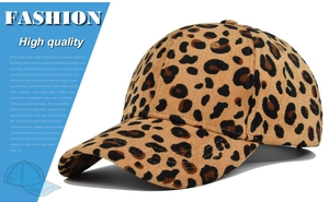 Detailed view of leopard print corduroy texture on the baseball cap's curved brim