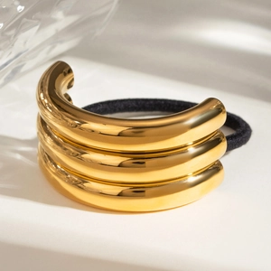 Three-row gold plated stainless steel metal ponytail cuff with black elastic hair tie