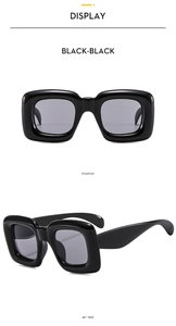 Front and side view of thick-frame square sunglasses for kids in solid black finish