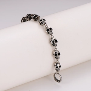 Punk style silver skull chain bracelet for men with vintage oxidized metal finish