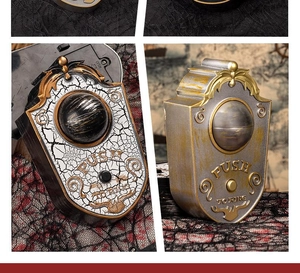 Detail of vintage gothic doorbells with distressed finishes and creepy eyeball designs