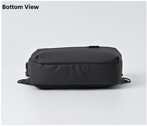 Detailed bottom view of men's black functional bag showing mesh fabric and stitching