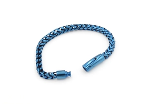 Detail view of a blue metal braided link bracelet with unique clasp on white background