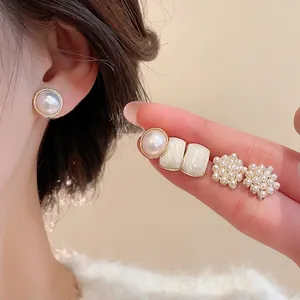 Elegant pearl stud earring set with vintage gold accents for a sophisticated daily look