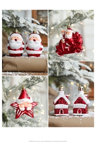 Close-up of assorted red and white Christmas ornaments including Santa and house shapes